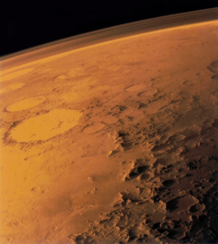 The haze above Mars is the planet’s atmosphere, as seen by the NASA probe Viking 1.