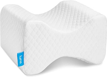This knee pillow is one of the home products that'll help you fall asleep faster. 