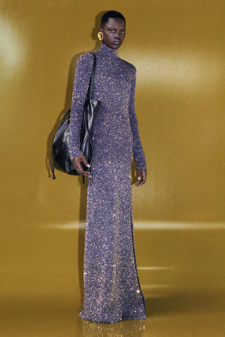 A female model in a Proenza Schouler sequin gown