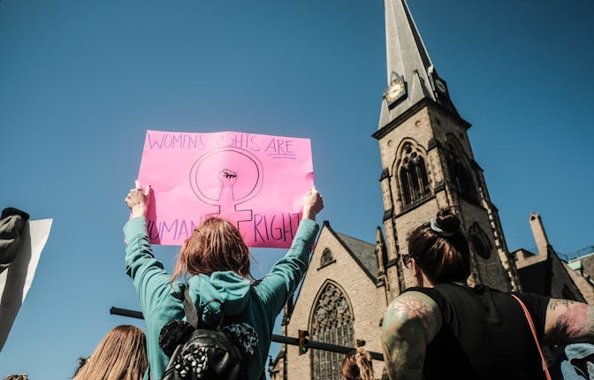 A pro-choice activist holds a placard in support of Roe v. Wade in Detroit, Michigan, on May 7, 2022...