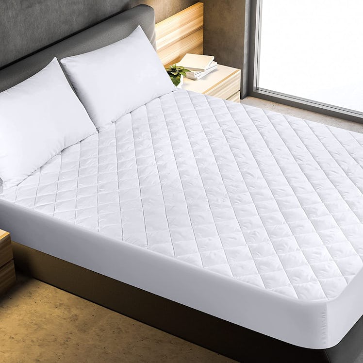 This mattress topper is a home product that'll help you fall asleep faster. 