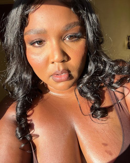 Lizzo poses for a sunlit selfie