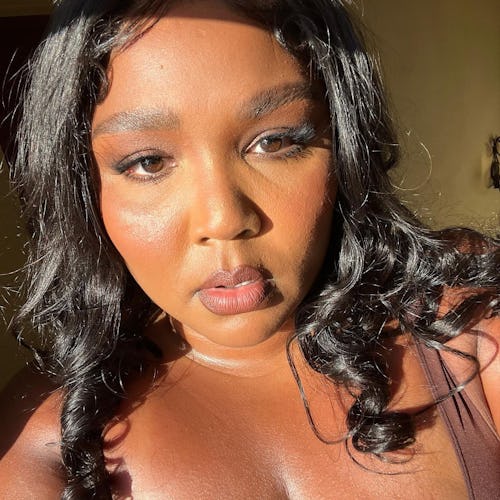 Lizzo poses for a sunlit selfie