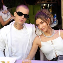 Hailey and Justin Bieber, Megan Fox and MGK, and other celebrity couples with matching tattoos.