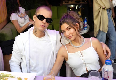 Hailey and Justin Bieber, Megan Fox and MGK, and other celebrity couples with matching tattoos.