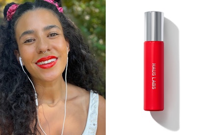 Beauty editor Amber Rambharose wears Haus Labs Atomic Shake Lip Lacquer in Red Coral