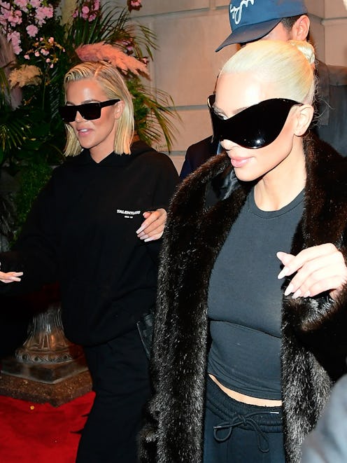 kim and khloe kardashian wearing black sunglasses