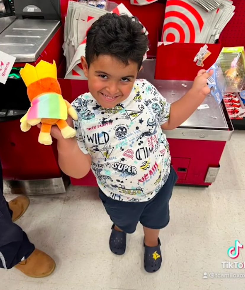A little boy poses happily in Target