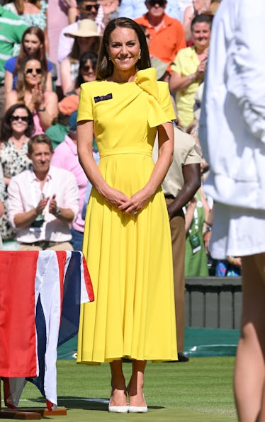 Kate Middleton wearing a bright yellow dress at Wimbledon