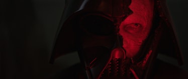 Anakin Skywalker (Hayden Christensen) looking through Darth Vader's broken mask in Obi-Wan Kenobi Ep...