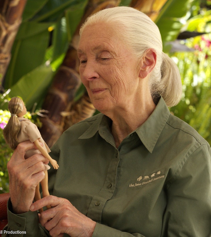 Dr. Jane Goodall admires a Barbie made in her likeness.