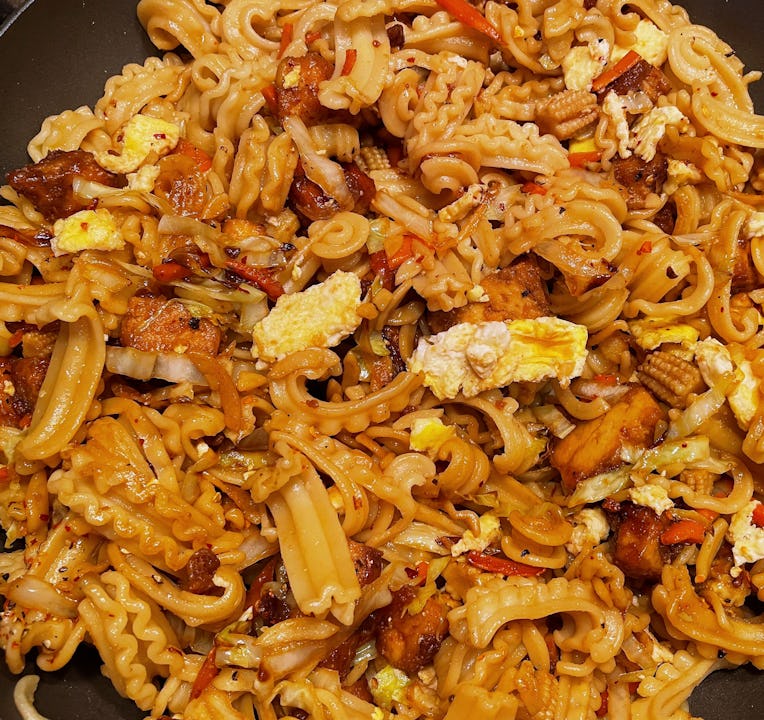 Stir-fried noodle dish with Italian pasta.