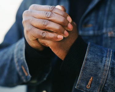 Close up of man cracking his knuckles.