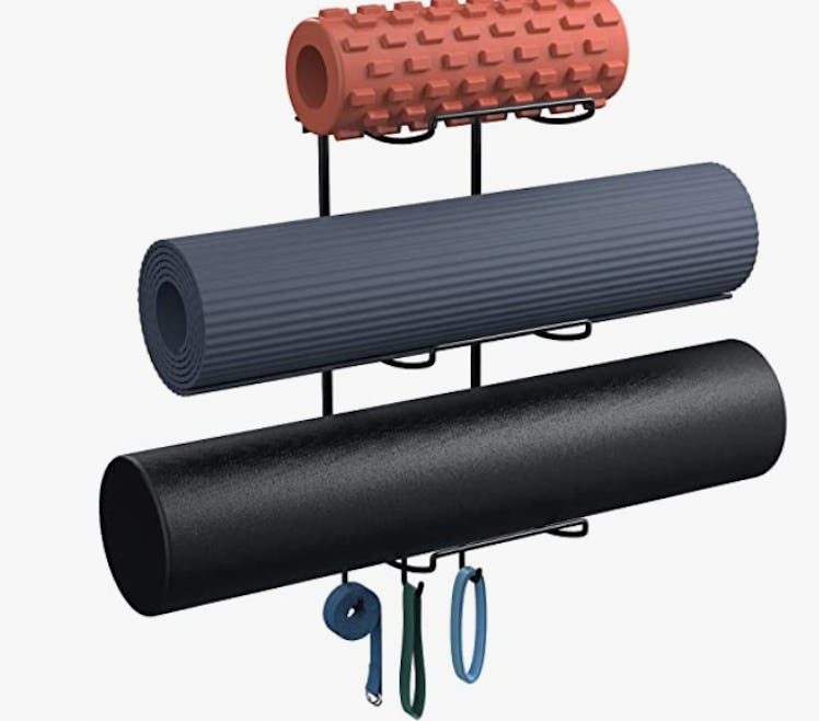 A black yoga mat rack is on sale for 44% off on Amazon Prime Day 2022.