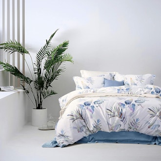 This reversible cotton duvet cover features a patterned side and a solid side.