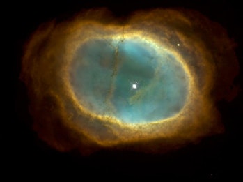 The Southern Ring Nebula, as seen by Hubble.
