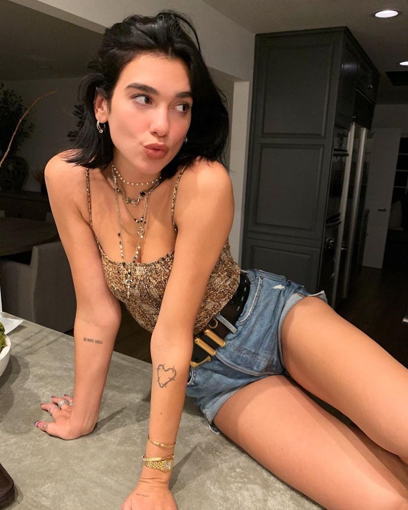 Dua Lipa has a tattoo that says "Sunny Hill."