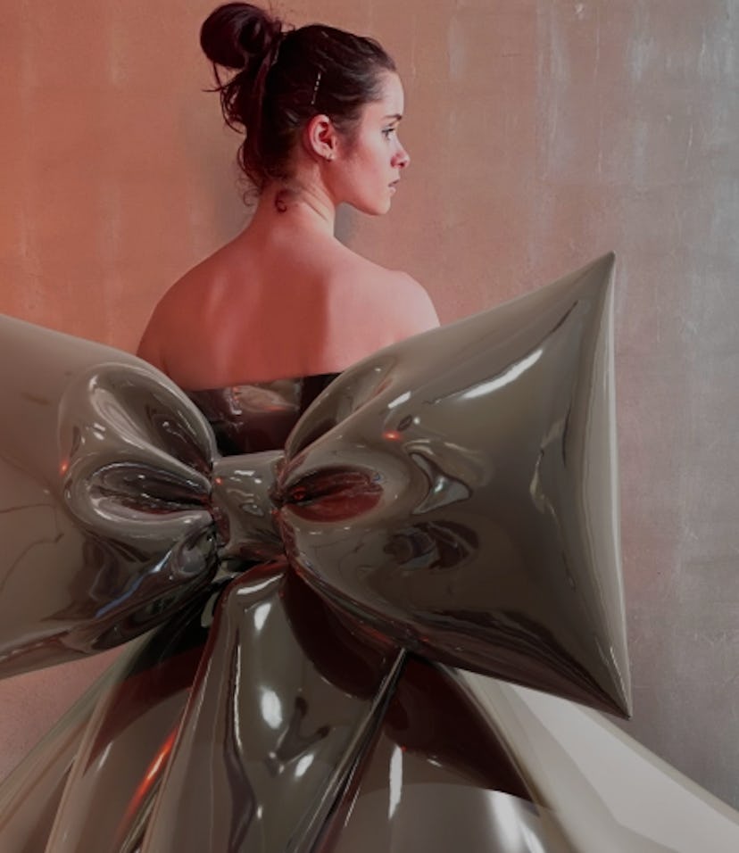 Draup founder Loftus in a digital dress from Tribute Brand.