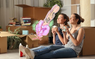 Two happy roommates moving home resting breathing fresh air sitting on the floor in the night.