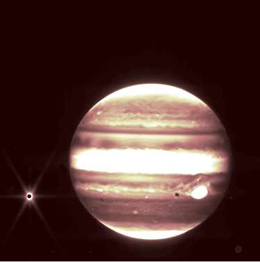 Jupiter shines next to its moon Europa (left). The planet appears in soft colors, with white regions...
