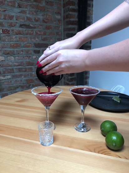 Pouring the frozen pomegranate margarita from 'The Summer I Turned Pretty' Season 1 