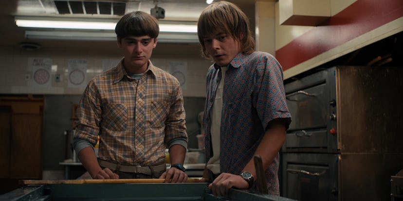 Noah Schnapp and Charlie Heaton, who play brothers Will and Jonathan, share an emotional moment in S...