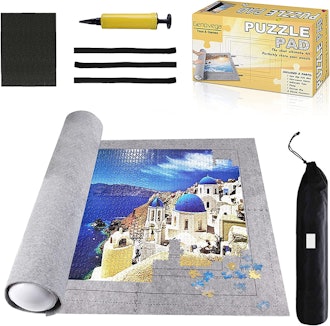 This roll-up puzzle mat holds up to 2,000 pieces and comes with a tube and air pump.