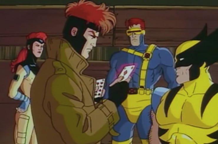 Gambit talking to Wolverine as Jean Grey and Cyclops stand in the back in X-Men