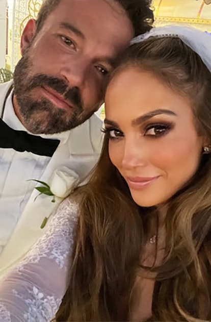Jennifer Lopez and Ben Affleck at their wedding in a photo shared from On The JLo, Jennifer Lopez's ...
