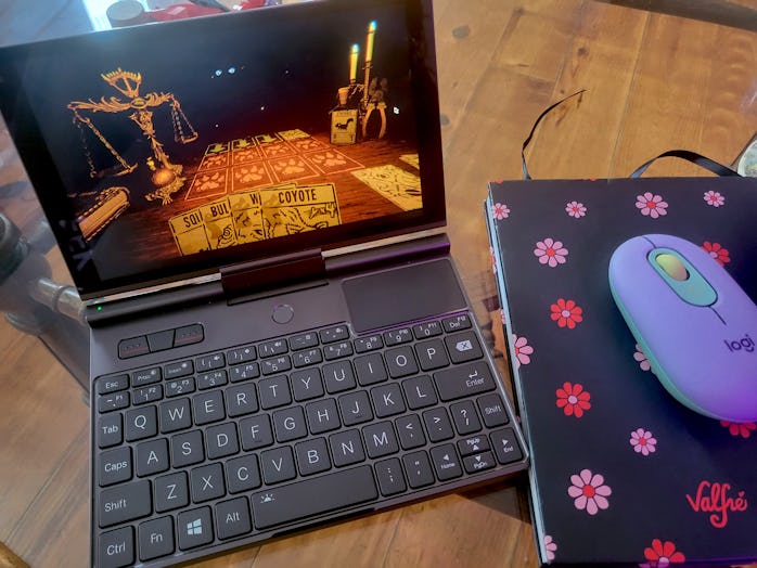 GPD Pocket pictured running the game Inscryption