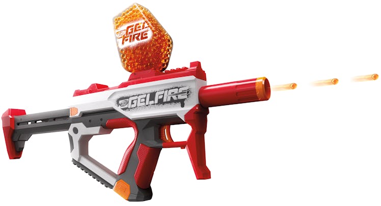 The Nerf Pro Gelfire Water Gun in red shooting small water pods