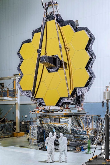 webb's mirrors in the cleanroom with two technicians standing by