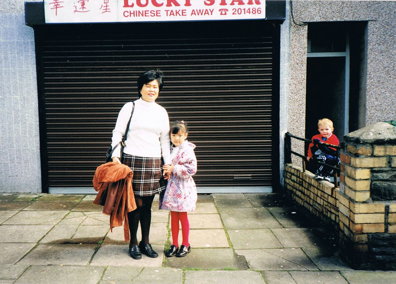 Angela Hui and her mum outside the takeaway