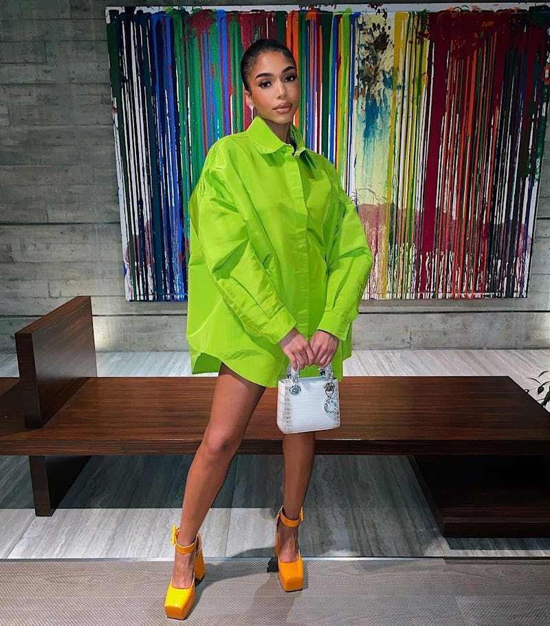 lori harvey neon green and orange outfit