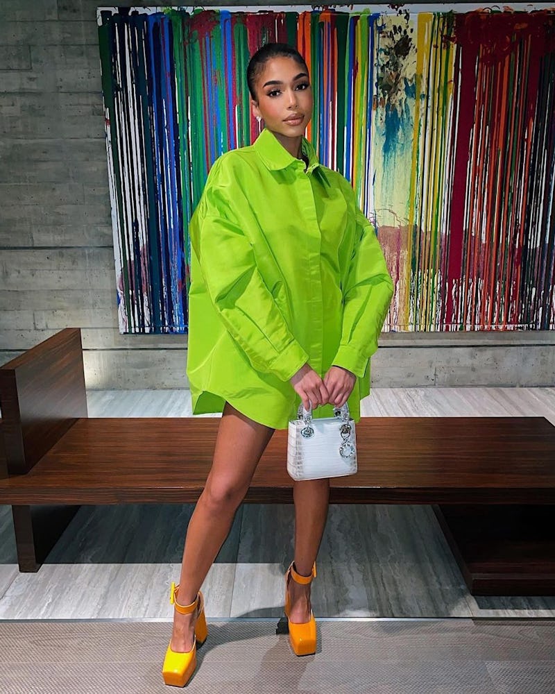 lori harvey neon green and orange outfit