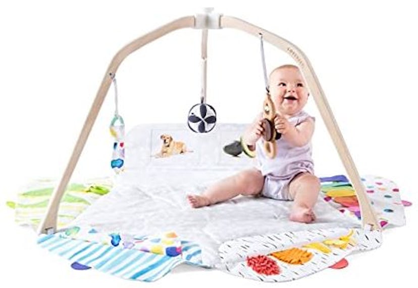 The Play Gym by Lovevery is a Montessori-inspired newborn toy that you can use for several years. 