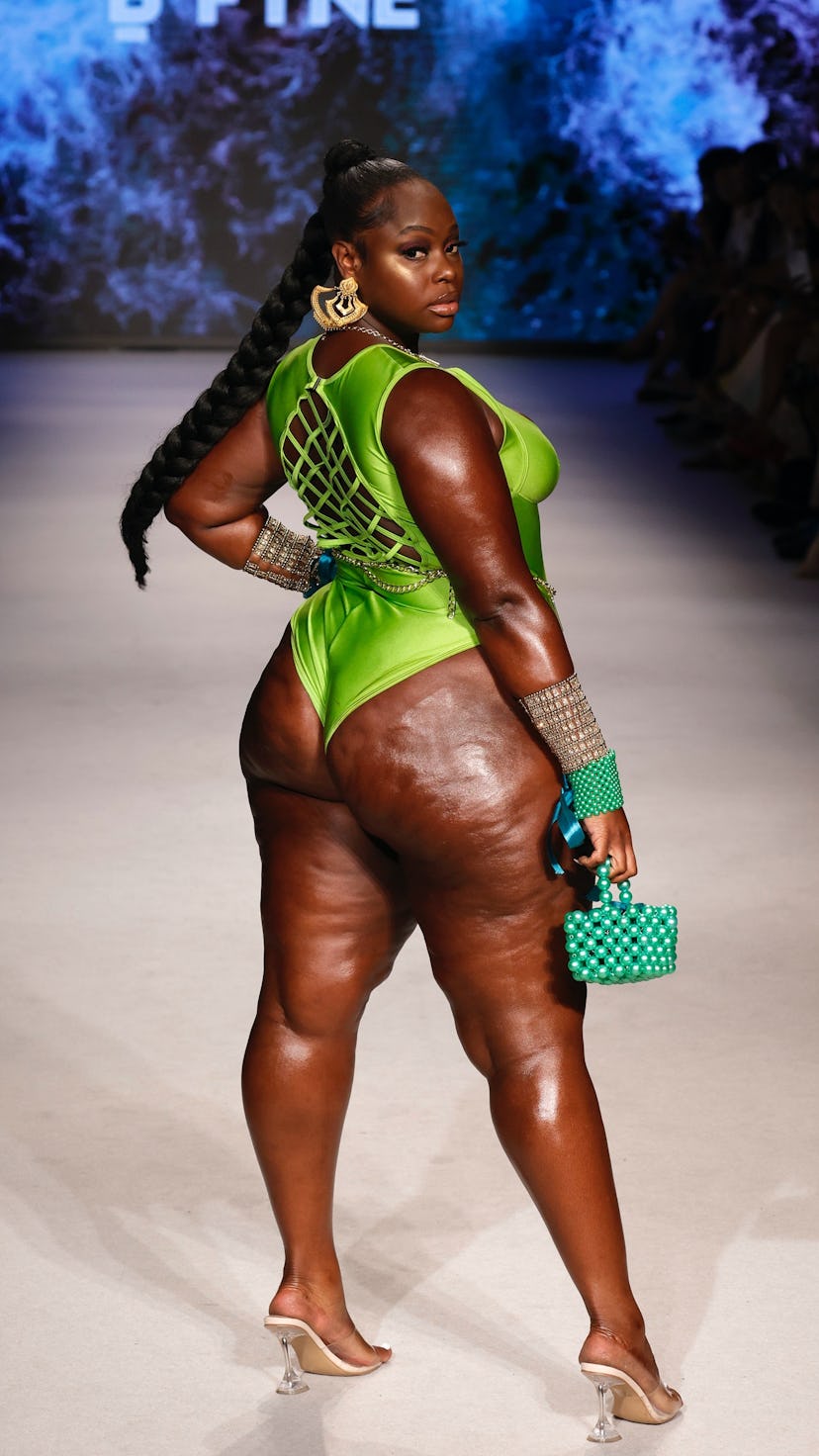 A model walks the runway for Models Of Colors Matters Presents BFyne at Paraiso for Miami Swim Week ...