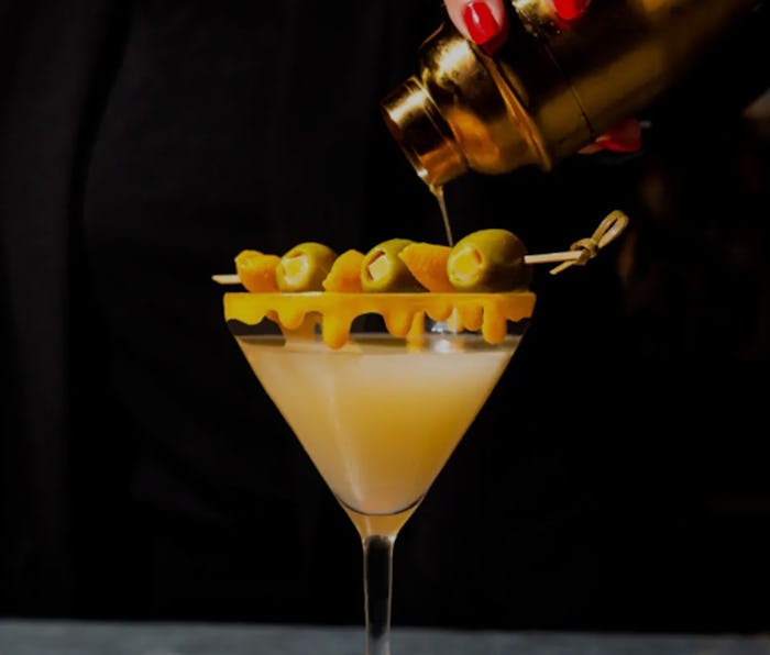 Velveeta's Veltini martini with olives and Velveeta garnish