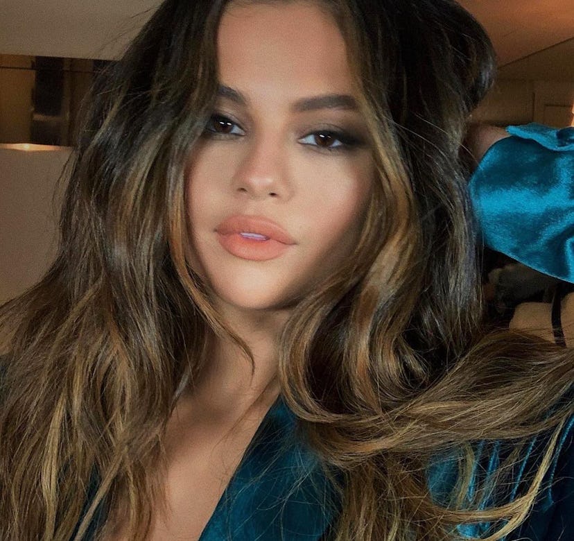 Selena Gomez selfie eyelashes smoky eye sultry