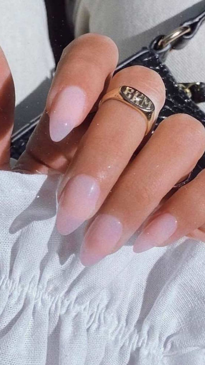 A DIY at-home glazed doughnut manicure using Glamnetic press-on nails.