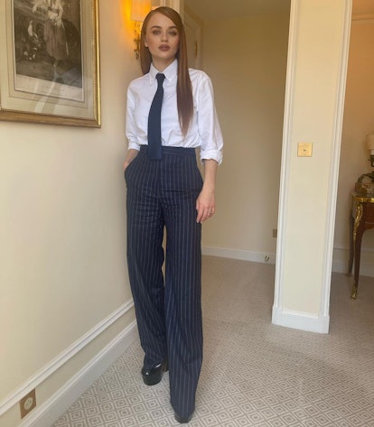 Joey King wearing a uniform-esque outfit