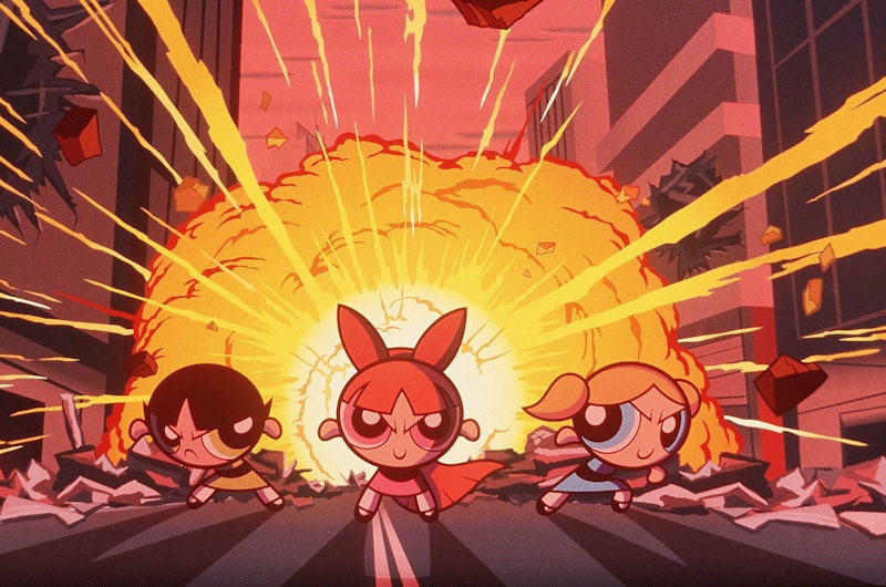 A still from the cartoon The Powerpuff Girls showing Blossom, Bubbles and Buttercup in fighting mode...