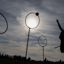 People playing the 'Harry Potter' inspired game, formerly called Quidditch, in France