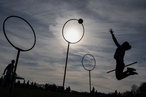 People playing the 'Harry Potter' inspired game, formerly called Quidditch, in France