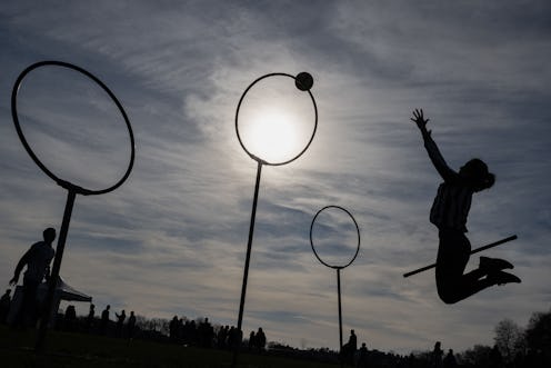 People playing the 'Harry Potter' inspired game, formerly called Quidditch, in France