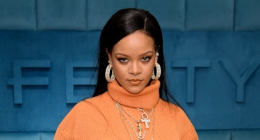 Rihanna wearing a knit orange turtleneck dress