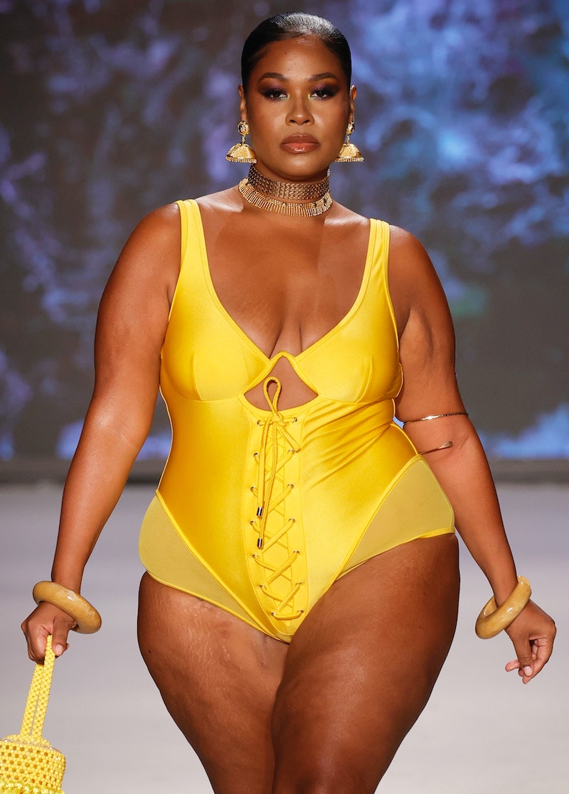 A model walks the runway for Models Of Colors Matters Presents BFyne at Paraiso for Miami Swim Week ...