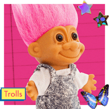 Happy troll doll with pink hair and cozy jumpsuit
