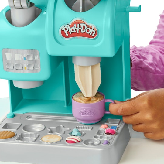 Kids can make pretend drinks with the Play-Doh Kitchen Creations Café playset.