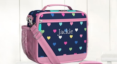 Personalized lunchbox that says Jackie. Lunchbox with water bottle holder.